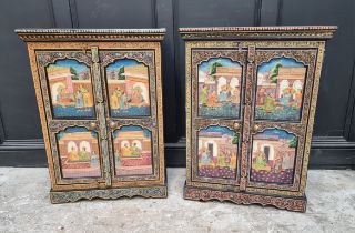 A decorative pair of Indian painted side cabinets, 65.5cm wide.