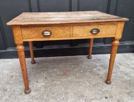A late Victorian pale oak desk, 107cm wide.