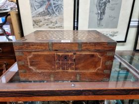 An unusual 19th century teak, inlaid and brass bound casket, 30cm wide, (with void interior).