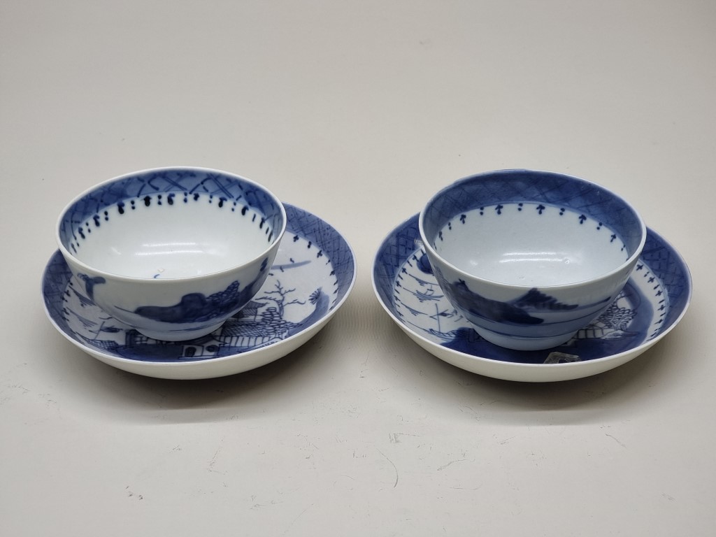 A pair of Chinese blue and white 'Diana Cargo' shipwreck tea bowls and saucers, the bowls 11cm