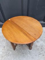A small reproduction oak credance table, 80.5cm wide.