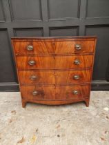 An early 19th century mahogany bowfront chest of drawers, 106cm wide, (splits to top).