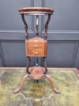 A George III mahogany tripod shaving stand, with turned bone knobs.