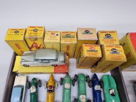 Dinky: a collection of nine vintage Dinky toys, in original boxes, (some repaints, repairs and