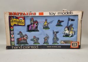 Britains: a vintage boxed set of Swoppets 'Knights', with blue plastic insert and red box lettering.