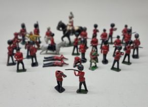 Britains: a small group of vintage lead Britains soldiers, (losses).