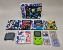 Nintendo: an original grey Game Boy, in box (missing one end flap); together with a Kiwi green