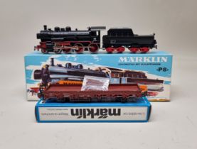 Marklin: a boxed locomotive and coal wagon, No.8398; together with a similar low sided car, No.4694.