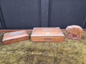 Two similar Indian carved hardwood caskets, largest 30.5cm wide; together with similar novelty