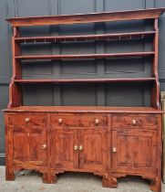 A solid yew dresser and rack, by Stephen Clear, 197cm wide.