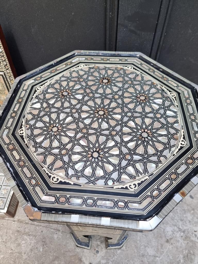 A Moorish mother-of-pearl inlaid octagonal occasional table, 40cm wide; together with a similar wall - Image 3 of 5