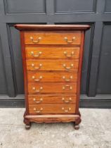 A hardwood chest of drawers, 65.5cm wide.