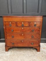 A George III mahogany and line inlaid chest of drawers, with ivory escutcheons, 114cm wide. DEFRA