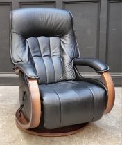 A Himolla Mosel Maxi black leather electric recliner armchair.