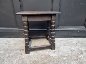 An oak joint stool, 46cm wide.