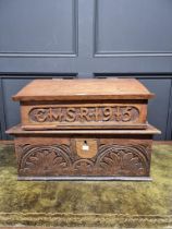 A late 17th century carved oak bible box, 56cm wide, (faults and repairs); together with another oak