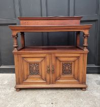 A circa 1900 carved mahogany buffet, 122cm wide.