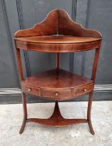 A George III mahogany and line inlaid corner washstand, 99cm high, (alterations).