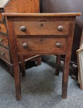 An unusual 19th century mahogany two drawer printer's table, 56cm wide.