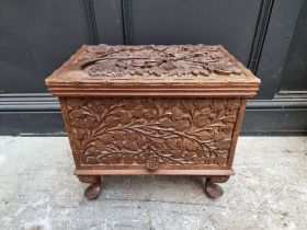 An Eastern carved wood workbox, 46cm wide.