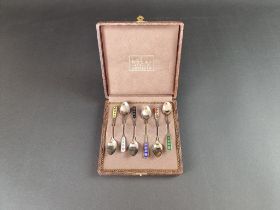 A cased set of six Swedish white metal and enamel coffee spoons, stamped 'Egon Lauridsen, Sterling',