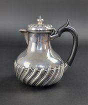 A Victorian silver hot water jug, by John Aldwinckle & Thomas Slater, London 1891, 16cm high,