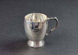 A silver Christening mug, by Atkin Brothers, Sheffield 1955, 8.5cm high, 130g.