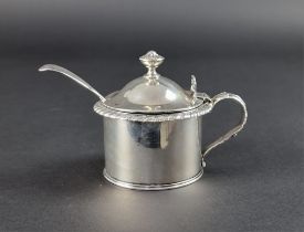 A George III silver gadrooned mustard pot, London 1820, maker's mark rubbed, with an unmatched