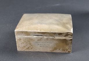 A silver cigarette box, by Charles Edwin Turner, Birmingham 1920, engraved 'Gunroom Mess H.M.S
