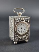 A small Victorian silver carriage timepiece, by Charles Henry Dumenil, London 1891, height including