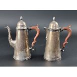 A silver coffee pot and matching hot water jug, by S W Smith & Co, Birmingham 1924, 11cm high, 922g.