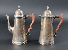 A silver coffee pot and matching hot water jug, by S W Smith & Co, Birmingham 1924, 11cm high, 922g.