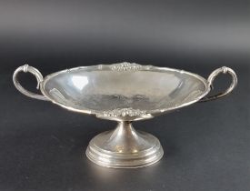 A continental white metal twin handled pedestal bowl, stamped '.800', 11cm high.