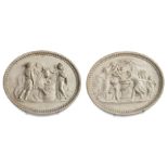 A rare pair of Coade stone oval plaques