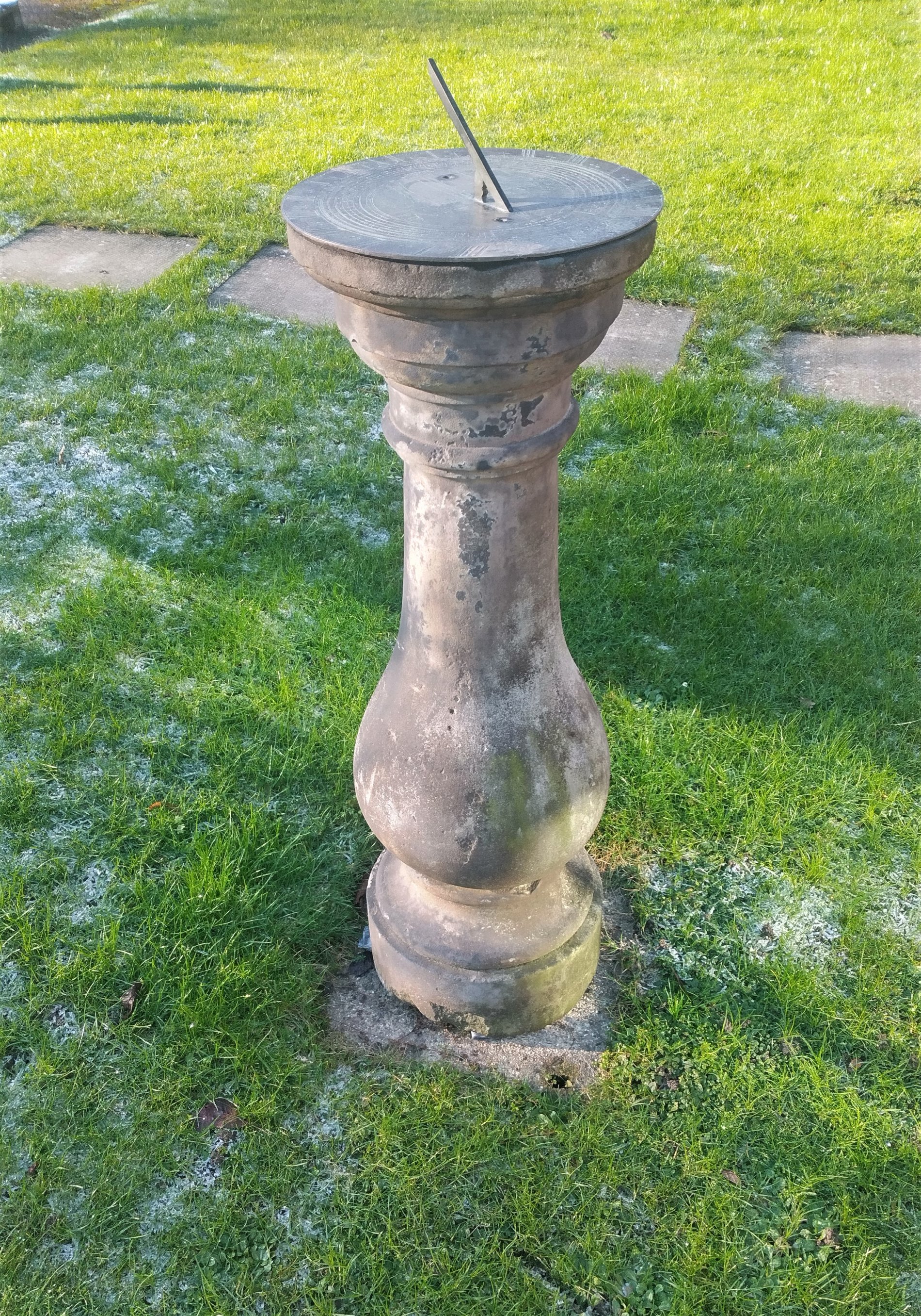 A rare Georgian carved stone sundial