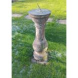 A rare Georgian carved stone sundial