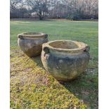 A rare pair of carved Cotswold limestone scroll pots