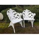 A pair of Coalbrookdale Fern and Blackberry pattern chairs