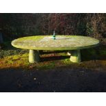 An extremely rare and massive carved sandstone oval table