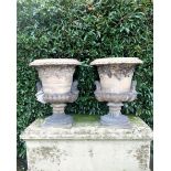 A pair of substantial Doulton stoneware urns