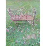 A wrought iron love seat
