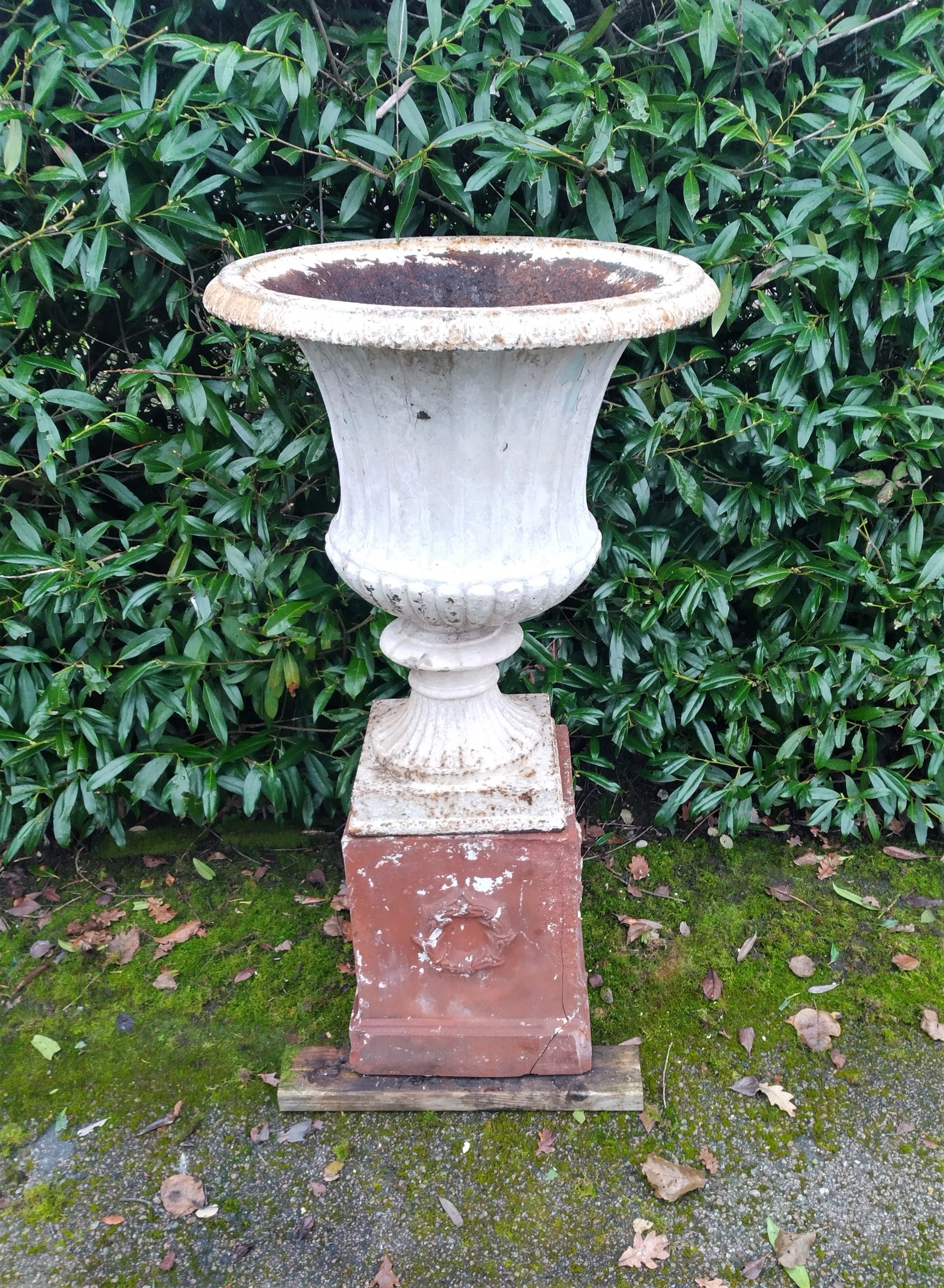 A Victorian cast iron urn