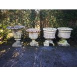 A pair of Victorian terracotta urns