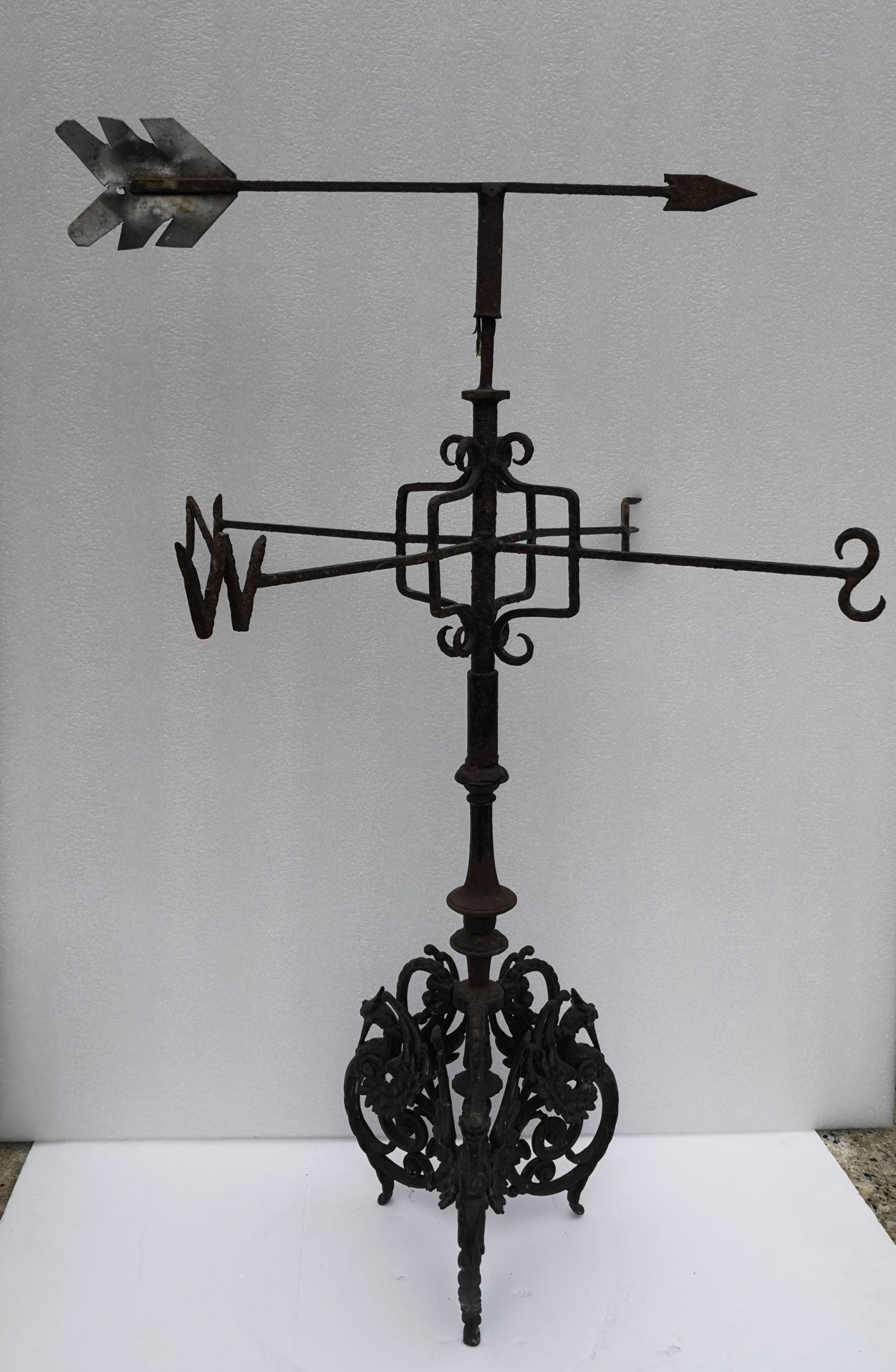 A cast and wrought iron weather vane