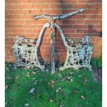 A pair of unusual Victorian cast iron seat ends and frame