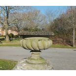 A composition stone urn