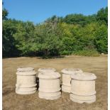 A pair of unusual carved stone planters