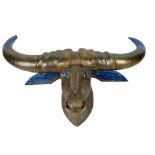 A similar gilded and carved hardwood buffalo head