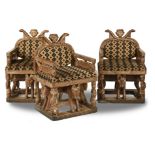 A set of three upholstered hardwood chairs