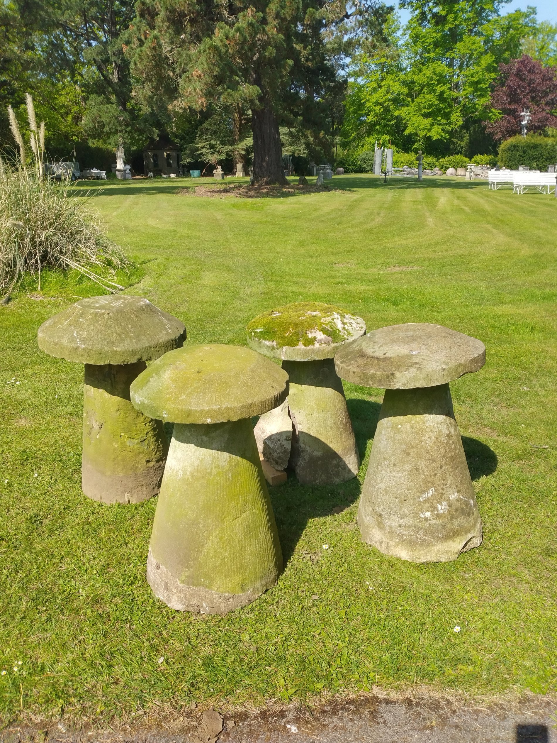 A set of four sandstone staddlestones